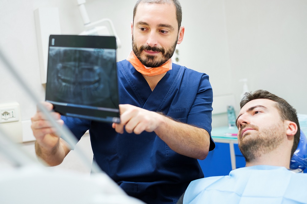 dentist explaining about dental x-ray